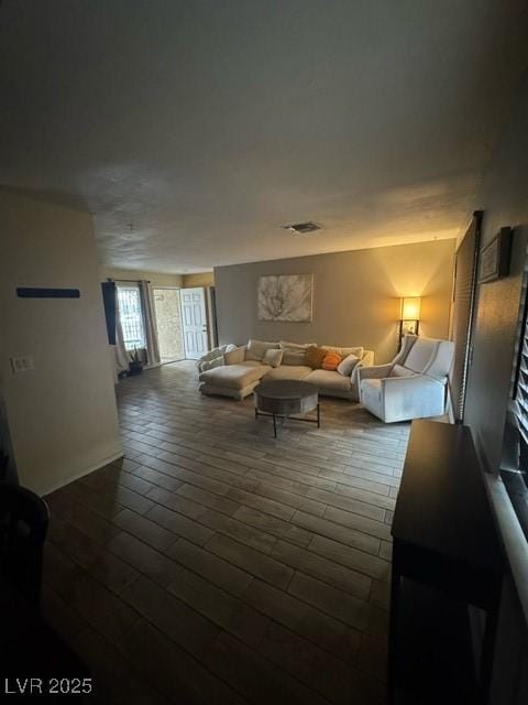 4820 Mahogany Dr, Las Vegas, NV 89110 - living area featuring dark wood finished floors
