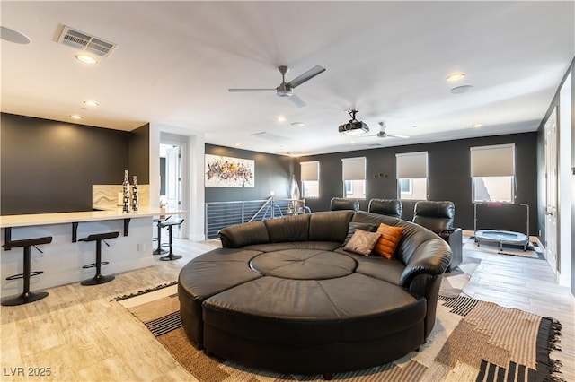 3458 W Agate Ave, Las Vegas, NV 89139 - home theater featuring light wood finished floors, ceiling fan, recessed lighting, and baseboards