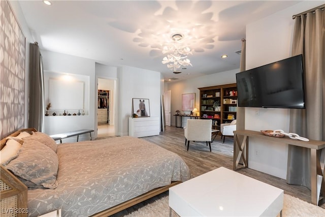 3458 W Agate Ave, Las Vegas, NV 89139 - bedroom with a chandelier, wood finished floors, and recessed lighting