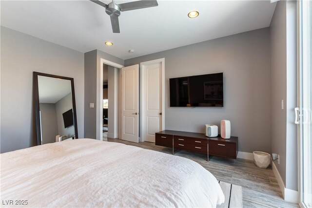 3458 W Agate Ave, Las Vegas, NV 89139 - bedroom with wood finished floors, baseboards, ceiling fan, and recessed lighting
