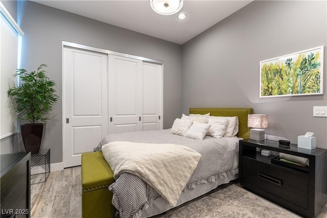 3458 W Agate Ave, Las Vegas, NV 89139 - bedroom featuring a closet, light wood-style flooring, recessed lighting, and baseboards