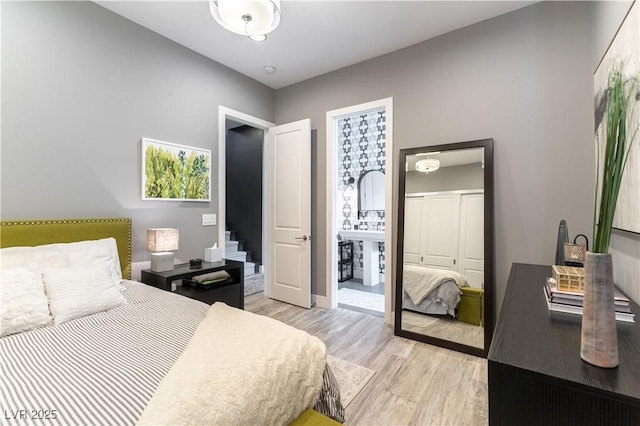 3458 W Agate Ave, Las Vegas, NV 89139 - bedroom with light wood-type flooring and baseboards