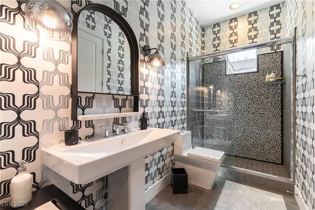 3458 W Agate Ave, Las Vegas, NV 89139 - bathroom with toilet, a stall shower, and tile patterned floors