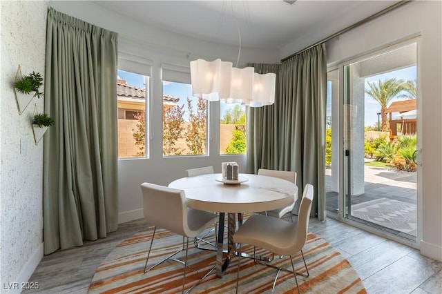 3458 W Agate Ave, Las Vegas, NV 89139 - dining room featuring baseboards