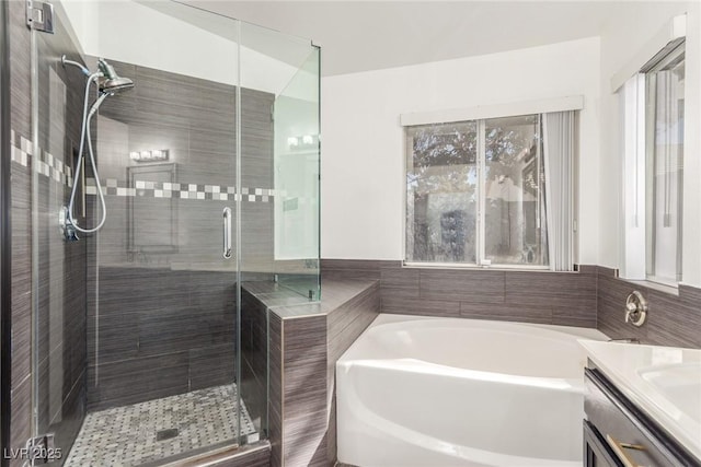 286 Fairmeadow St, Henderson, NV 89012 - bathroom featuring a stall shower, a bath, and vanity