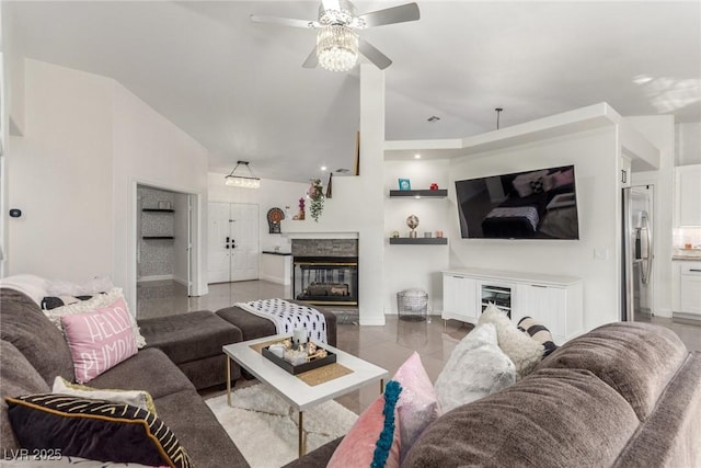 286 Fairmeadow St, Henderson, NV 89012 - living area featuring a multi sided fireplace, ceiling fan, and tile patterned flooring