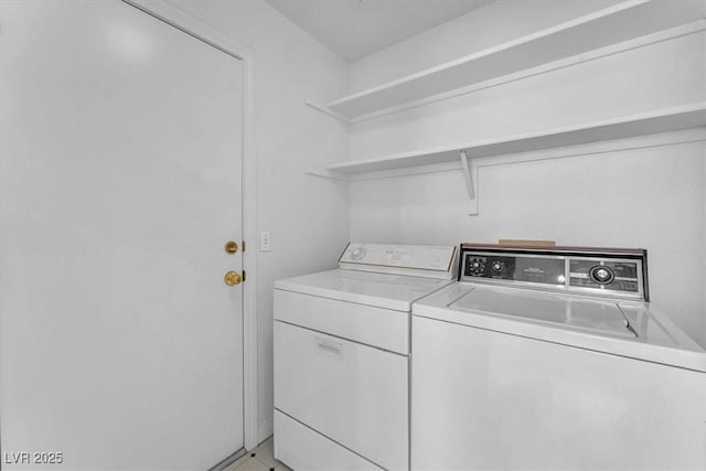 laundry room featuring separate washer and dryer
