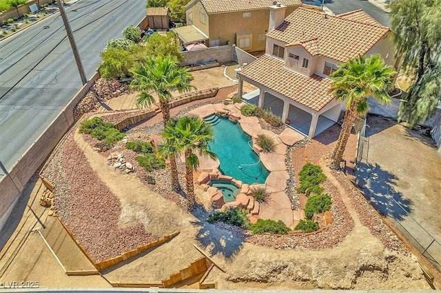 view from above of property featuring a pool area