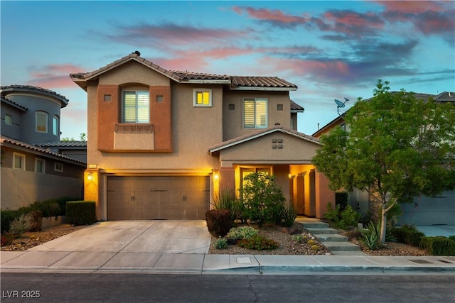 11228 Hedgemont Ave, Las Vegas, NV 89138 - mediterranean / spanish home with an attached garage, stucco siding, driveway, and a tiled roof
