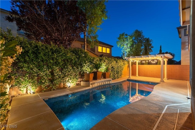 11228 Hedgemont Ave, Las Vegas, NV 89138 - pool at night featuring a pergola and a fenced backyard