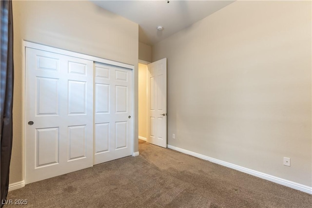 11228 Hedgemont Ave, Las Vegas, NV 89138 - unfurnished bedroom featuring carpet floors, a closet, and baseboards