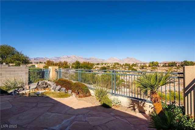 10336 Birch Bluff Ln, Las Vegas, NV 89145 - view of patio featuring a mountain view and fence