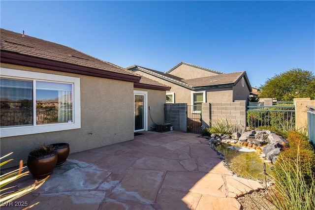10336 Birch Bluff Ln, Las Vegas, NV 89145 - view of patio with fence and a gate