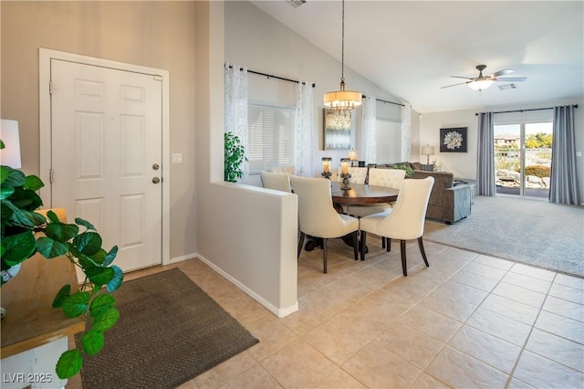 10336 Birch Bluff Ln, Las Vegas, NV 89145 - entrance foyer featuring lofted ceiling, light tile patterned floors, light carpet, baseboards, and a chandelier
