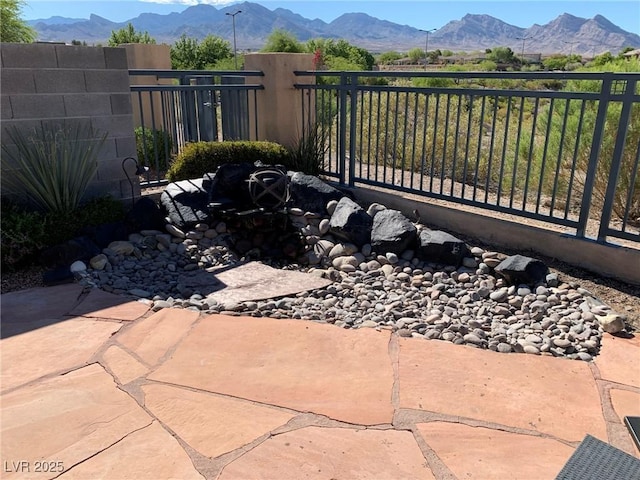 10336 Birch Bluff Ln, Las Vegas, NV 89145 - view of patio / terrace with a mountain view and fence