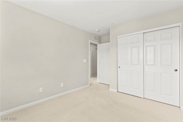 160 Lomita Heights Dr, Las Vegas, NV 89138 - unfurnished bedroom featuring light carpet and a closet