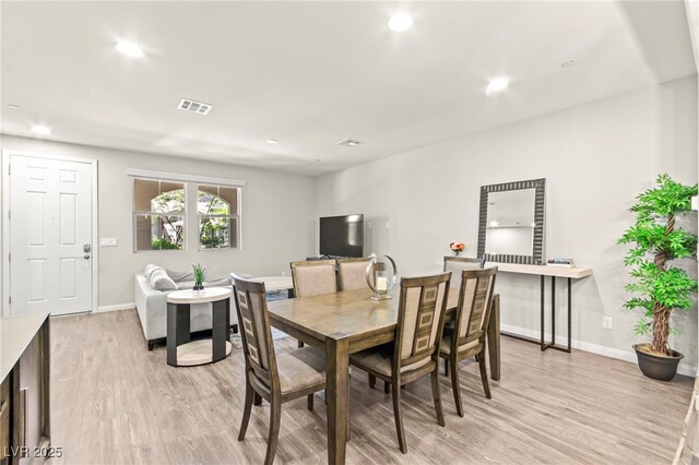 160 Lomita Heights Dr, Las Vegas, NV 89138 - dining area featuring light wood-style floors and recessed lighting