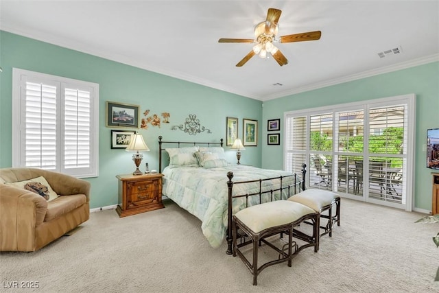 carpeted bedroom with ornamental molding, baseboards, ceiling fan, and access to outside