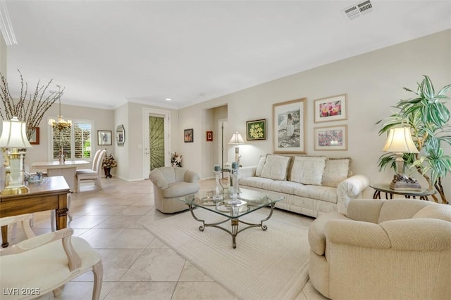 living room featuring a chandelier, ornamental molding, light tile patterned floors, baseboards, and recessed lighting