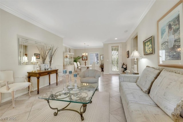 living room featuring light tile patterned floors, a chandelier, crown molding, and baseboards