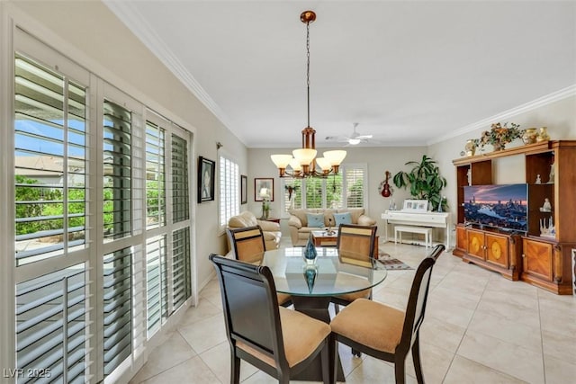 dining area with a chandelier, light tile patterned floors, and ornamental molding