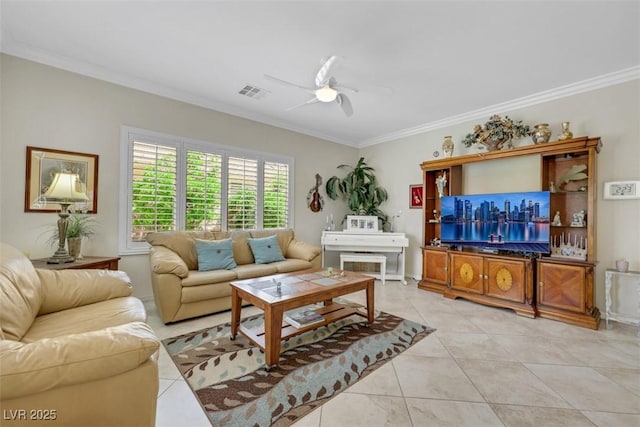living room with crown molding, ceiling fan, and light tile patterned floors