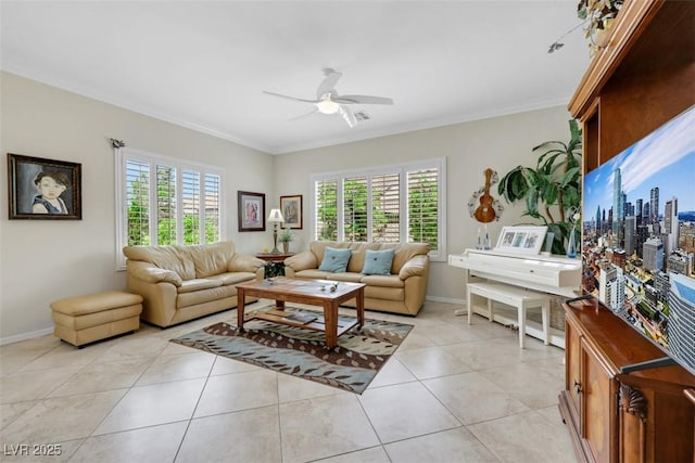 living area with ceiling fan, ornamental molding, light tile patterned flooring, and baseboards