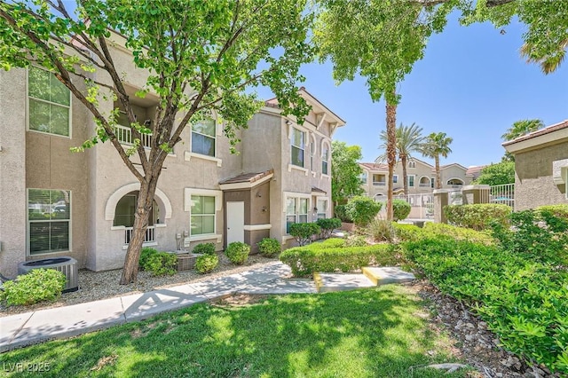 view of community featuring a residential view and a lawn