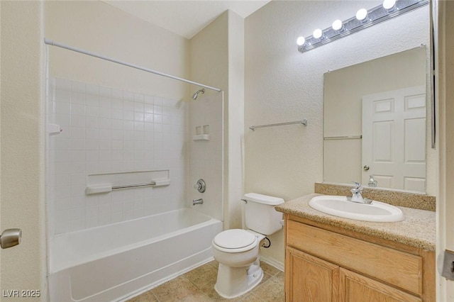 bathroom with toilet, vanity, shower / bathtub combination, tile patterned flooring, and baseboards