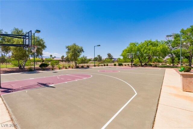 7434 Eggshell Dr, North Las Vegas, NV 89084 - view of sport court featuring community basketball court and fence