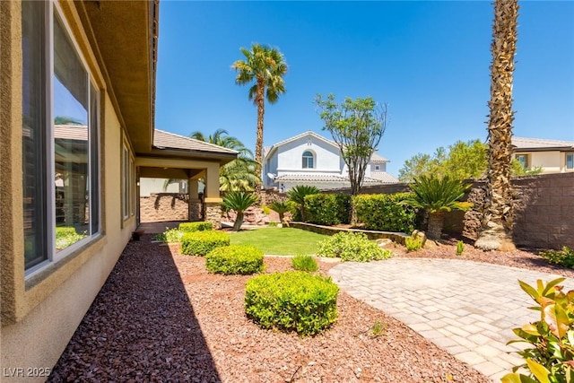 7434 Eggshell Dr, North Las Vegas, NV 89084 - view of yard featuring a patio area and fence