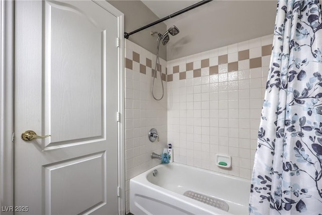 bathroom with shower / tub combo with curtain