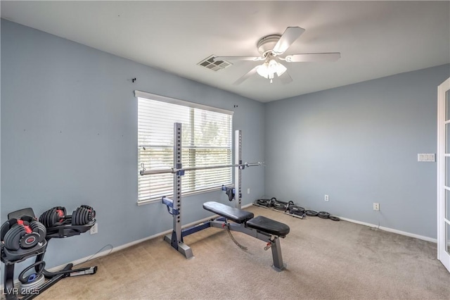 workout room with carpet flooring, ceiling fan, and baseboards