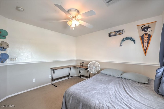 carpeted bedroom with baseboards and ceiling fan