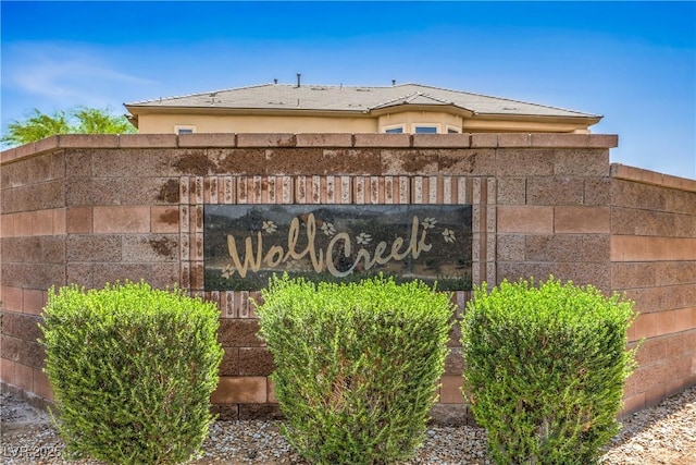 view of community sign