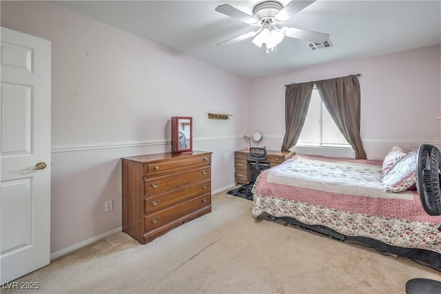 bedroom featuring carpet flooring, a ceiling fan, and baseboards