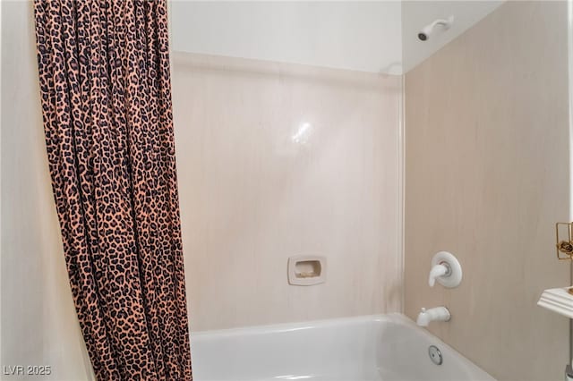bathroom featuring shower / bathtub combination with curtain