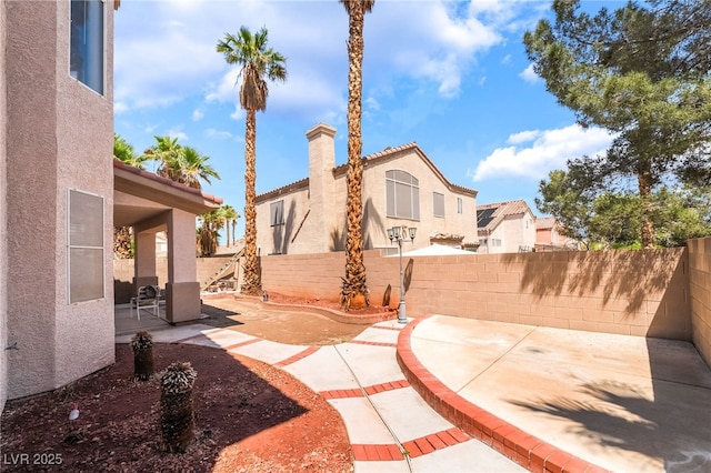 view of patio featuring a fenced backyard