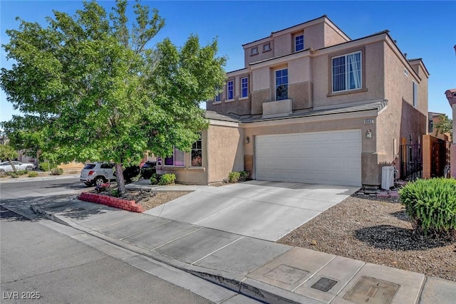 9065 W Torino Ave, Las Vegas, NV 89148 - view of front of home featuring stucco siding, an attached garage, and driveway