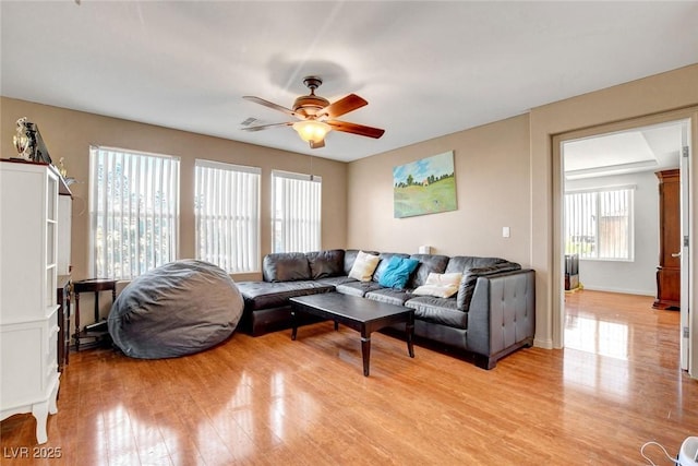 9065 W Torino Ave, Las Vegas, NV 89148 - living area with a ceiling fan and light wood finished floors