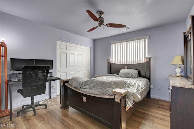 9065 W Torino Ave, Las Vegas, NV 89148 - bedroom featuring wood finished floors, baseboards, an office area, and a closet