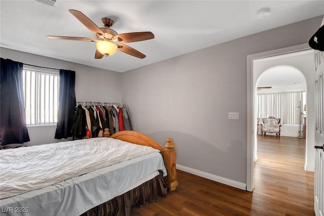 9065 W Torino Ave, Las Vegas, NV 89148 - bedroom featuring wood finished floors, baseboards, and a ceiling fan