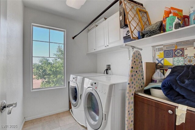 9065 W Torino Ave, Las Vegas, NV 89148 - laundry room with separate washer and dryer, cabinet space, and baseboards