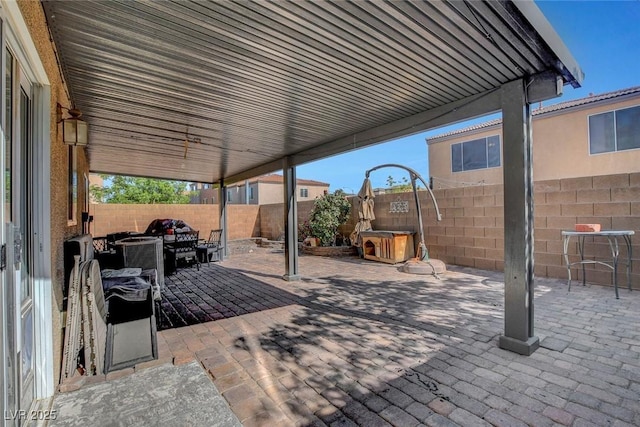 9065 W Torino Ave, Las Vegas, NV 89148 - fenced backyard featuring a patio area and a hot tub