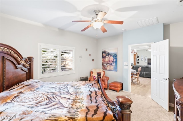 2720 Mickey Mantle Ct, Las Vegas, NV 89108 - bedroom featuring light colored carpet and a ceiling fan