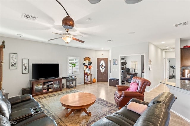 2720 Mickey Mantle Ct, Las Vegas, NV 89108 - living room with light wood finished floors, ceiling fan, recessed lighting, and baseboards