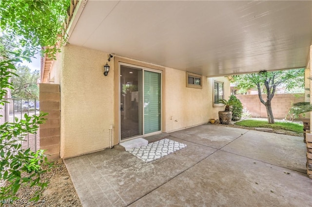 view of patio with fence