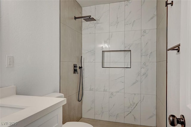 8412 Mulcahy Ave, Las Vegas, NV 89145 - bathroom featuring tiled shower, toilet, and vanity
