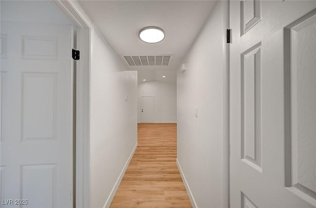 8412 Mulcahy Ave, Las Vegas, NV 89145 - hallway featuring light wood finished floors and baseboards