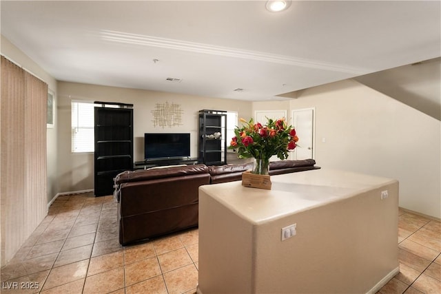3120 Inlet Bay Ave, North Las Vegas, NV 89031 - living area with light tile patterned floors and baseboards